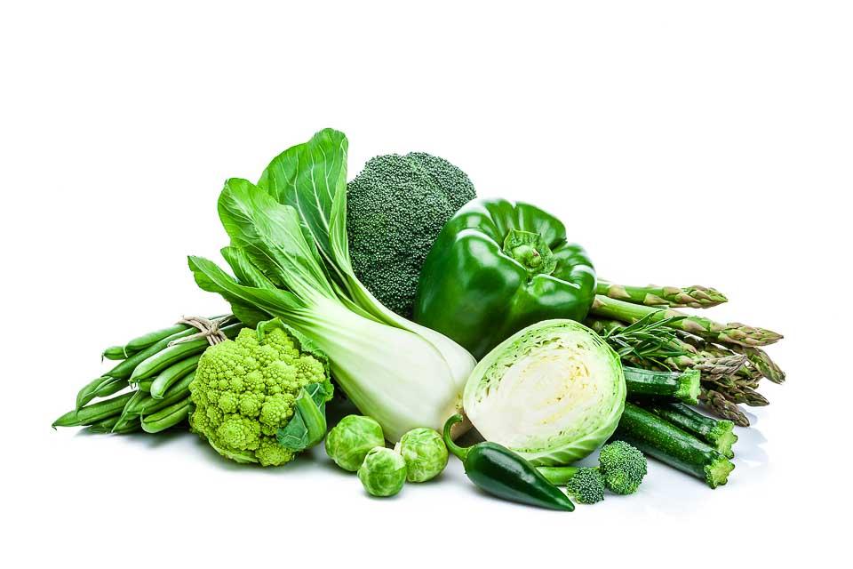 Assortment of green vegetables including pak choi, asparagus and broccoli representing Helen Ridgeway Elevate nutrition programme