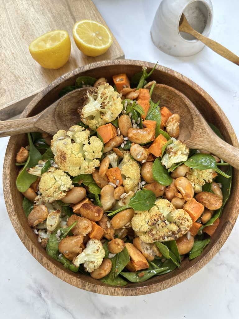 roasted butter beans with cauliflower sweet potato and sunflower seeds