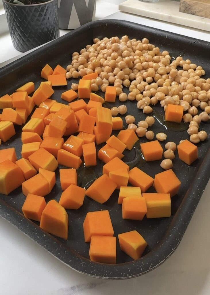 butternut squash and chickpeas on a baking tray