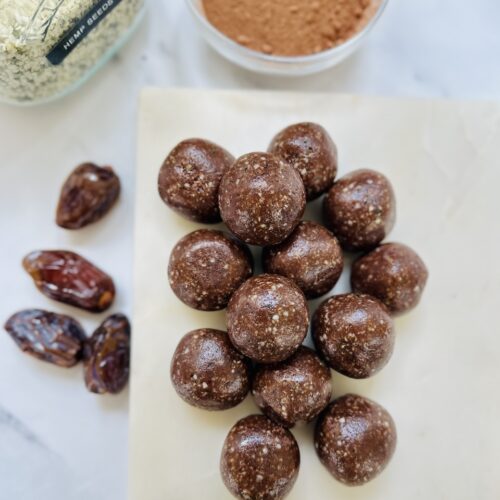 nut free energy balls on a chopping board