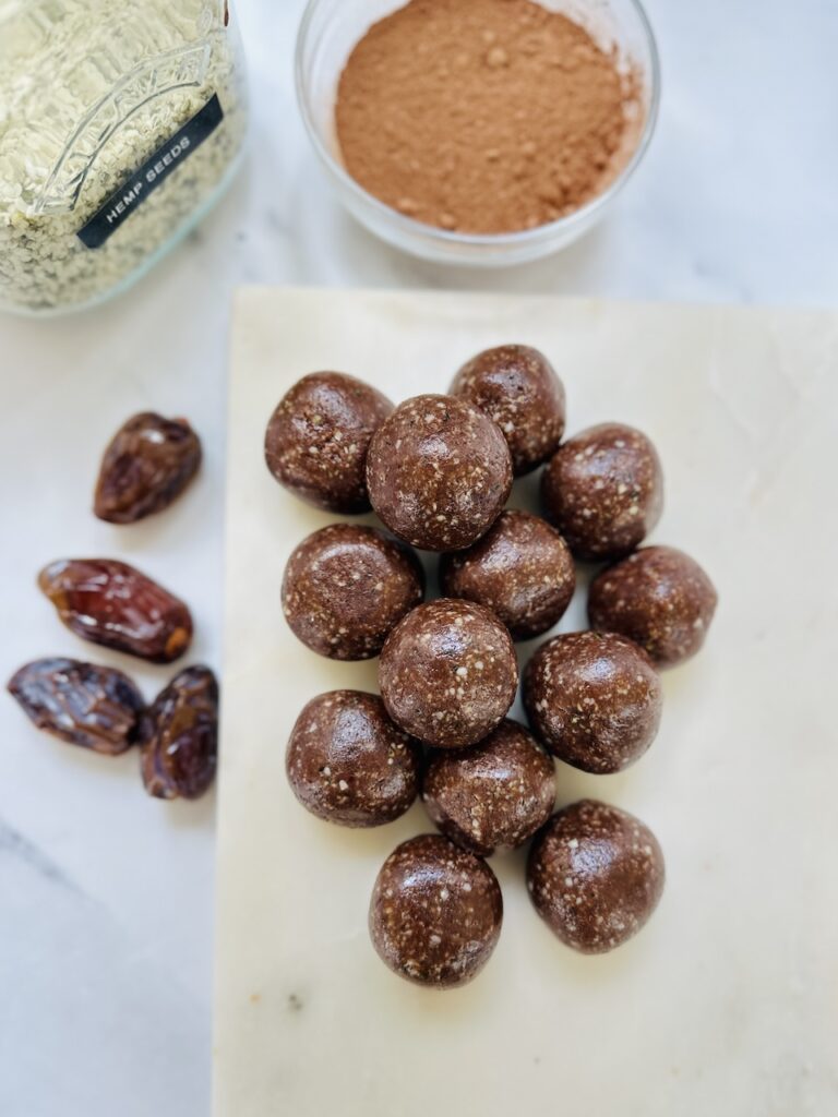 nut free energy balls on a chopping board
