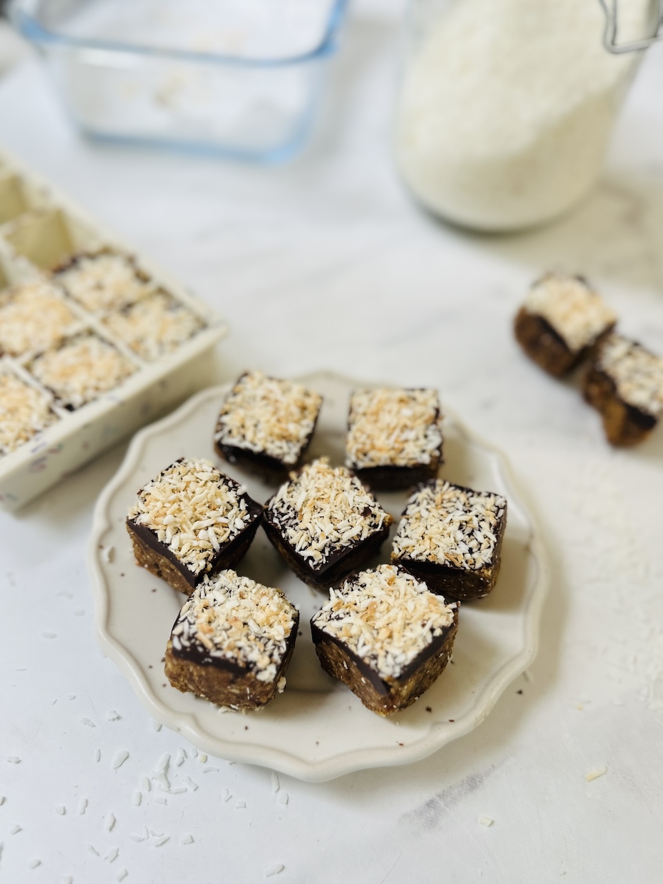 mini apricot bites main mini apricot bites made in an ice cube tray with dates and coconut