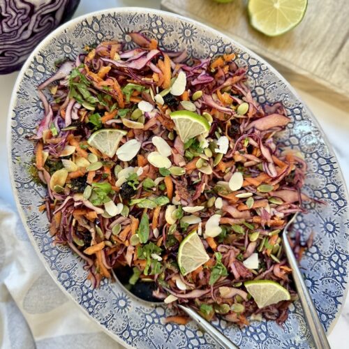 spicy red cabbage salad with carrots, onions and a spiced dressing