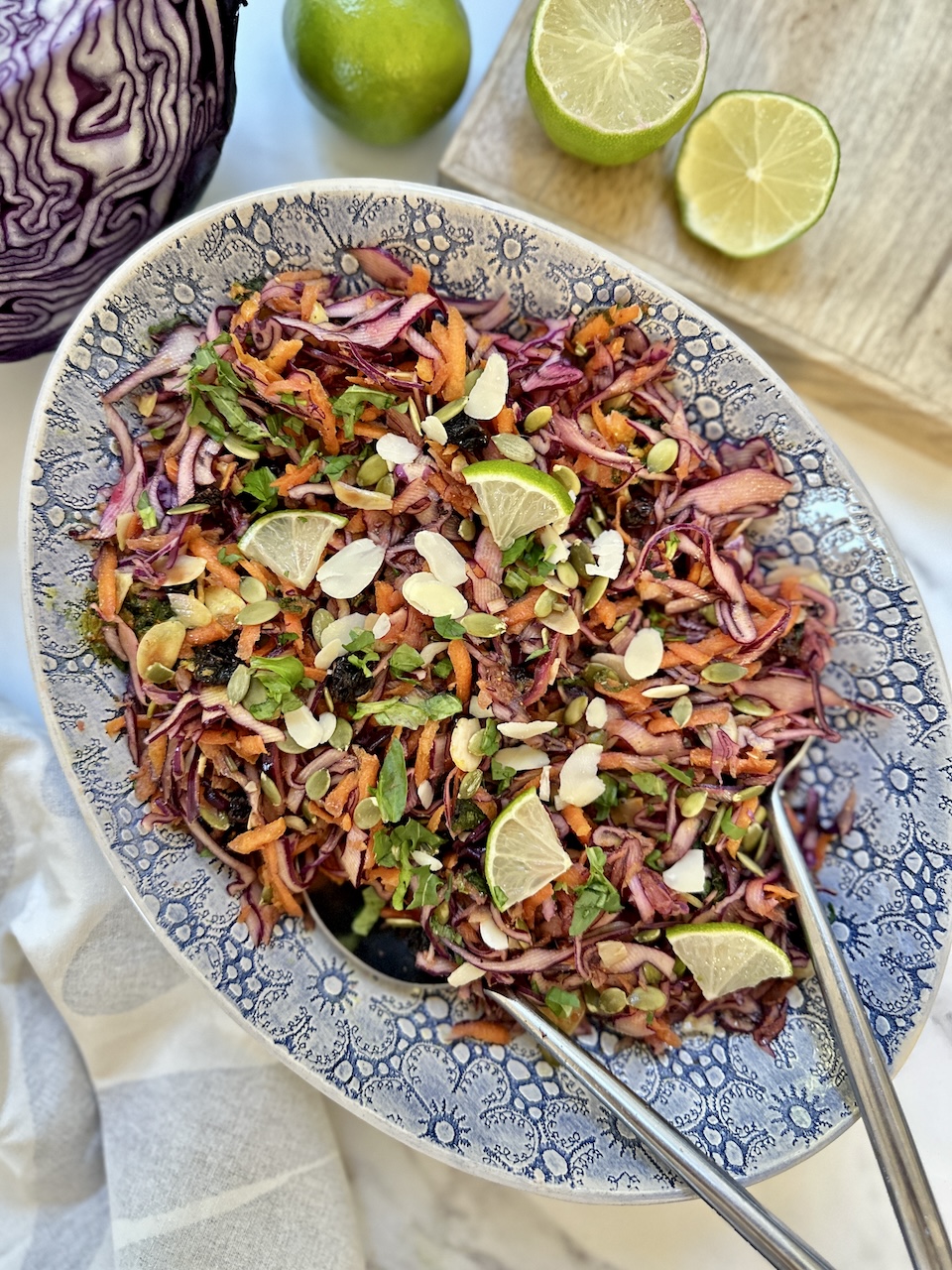 spicy red cabbage salad with carrots, onions and a spiced dressing