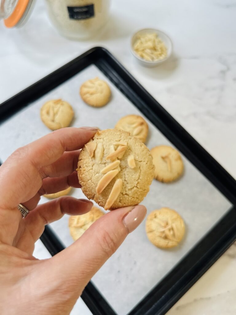 gluten free almond flour cookies with baking tray in background
