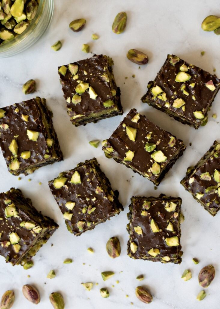 pistachio date bark with chopped nuts and medjool dates. Top down view
