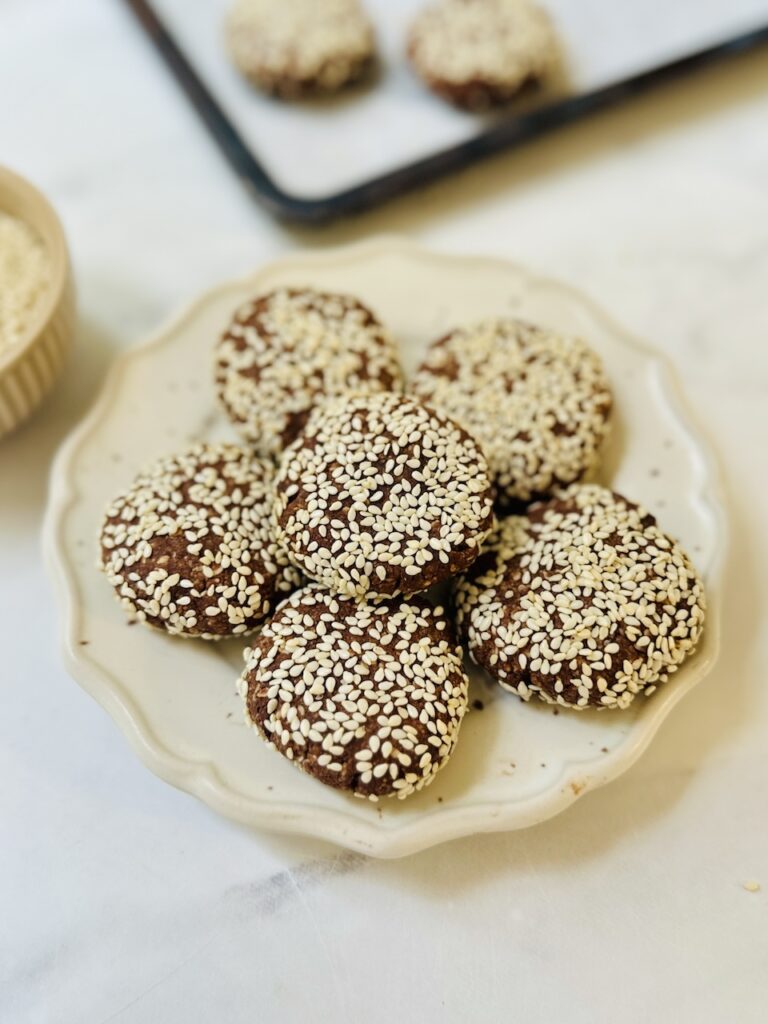 sesame cookies with cacao on a plate photo from the side